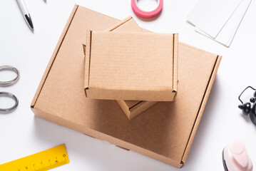 Small brown cardboard box for item shipping, mock up