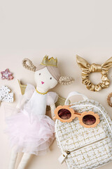 Set of baby girl hair accessories and stuff. Ragdoll with fashion hair bows, hair clips, hairpins and hair elastics.  Hairstyles for girls with stylish accessory.