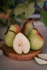 pears on a plate lie on the table