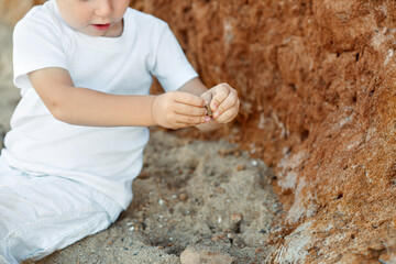 child playing with sand