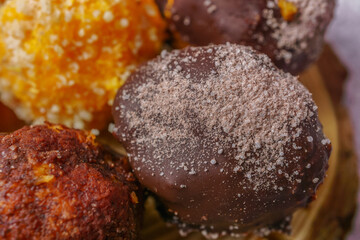 close-up of sweet truffles of different flavors