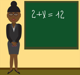 A teacher near the blackboard explains how to solve a mathematical equation