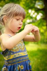 happy child having fun playing in the nature park