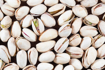 Top view of roasted salty pistachio nut in shell