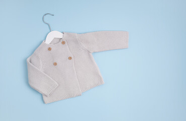 Gender neutral baby garment. Organic cotton clothes, newborn fashion, branding, small business idea. Flat lay, top view