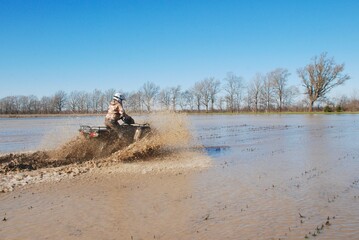 Four-wheeler fun in mud and water