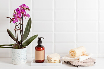 Bathroom styling and organization. Organic lifestyle and skin care products. Modern minimal design of bathroom refillable, reusable accessories