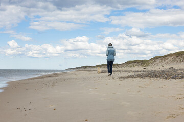 Waking on Sandy beach by Husby town. Populated place, Holstebro, Region Midtjylland, Denmark, Scandinavia, Europe