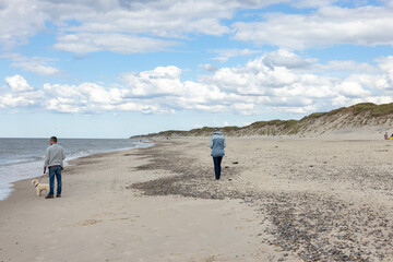 Waking on Sandy beach by Husby town. Populated place, Holstebro, Region Midtjylland, Denmark, Scandinavia, Europe