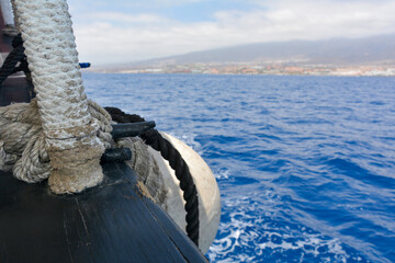Part of an old sailing ship facing the coast