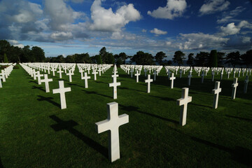 White Crosses For Fallen US Soldiers At The American Cemetery In Normandy France On A Beautiful...