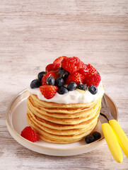 pancakes with yogurt and mix berry topping