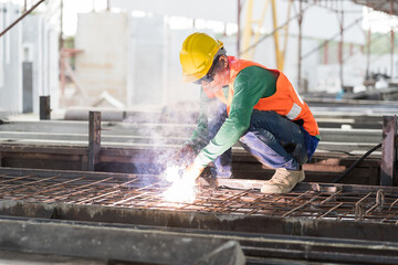 Welder welding worker working in the construction site. Asian welder welding workers at work
