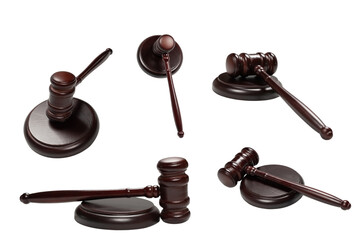 Wooden judge gavel and soundboard isolated on a white background.