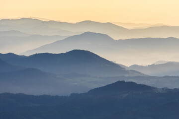 Fototapeta na wymiar Mountain layers during sunrise in the morning in Austria