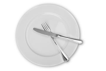 Silver knife and fork on white plate