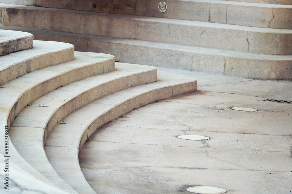 Aufkleber modern architecture. close up of design stairs made of stone in the park.