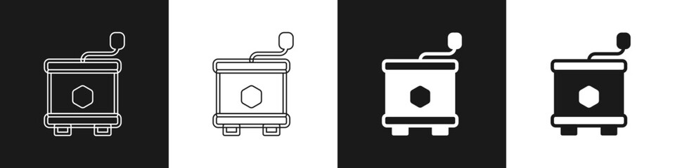 Set Honey extractor icon isolated on black and white background. Mechanical device for honey extraction from honeycombs. Vector
