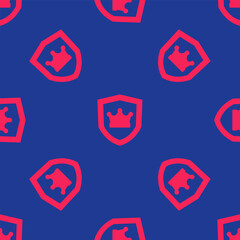 Red Shield with crown icon isolated seamless pattern on blue background. Vector