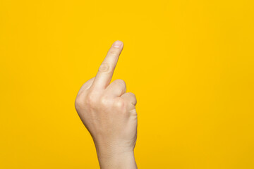 Finger hand symbols concept isolated sign of the middle finger in a gesture meaning fuck you or...