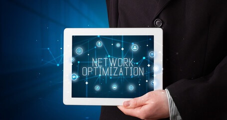 Person holding tablet, security concept