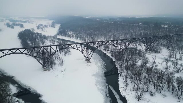 Railroad Bridge over Icy Winter Saint Croix River in Minnesota and Wisconsin