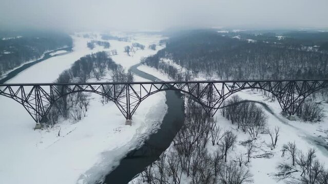 Railroad Bridge over Icy Winter Saint Croix River in Minnesota and Wisconsin