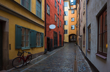 Stockholm old town Gamla Stan, Bicycle stands on a narrow street with colorful buildings, Sweden