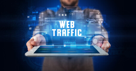 Person holding tablet, security concept