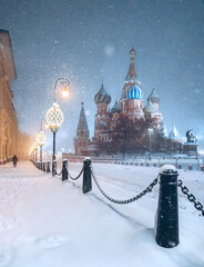 St. Basil's Cathedral on Red Square. New Year's Moscow. Night city. Snowfall