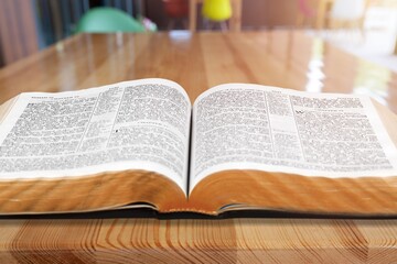 Fototapeta premium Open vintage old holy Bible book