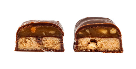 The chocolate bar is broken into pieces. Candy with milk filling