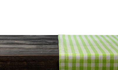 The empty wooden table covered with a color Picnic tablecloth.