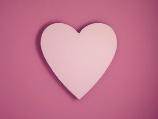 Fototapeta na wymiar Pink Heart On Pink Background