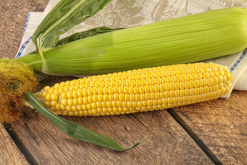 Yellow sweet raw cob corn