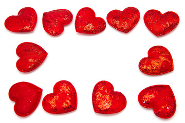 Frame made of red decorative hearts isolated on white background. Love. Valentine's Day concept. Free space for text.
