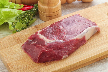 Raw rib-eye beef steak black angus