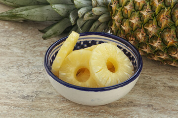 Marinated pineapple rings in the bowl