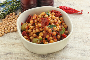Chickpea beans with dry tomato and olives