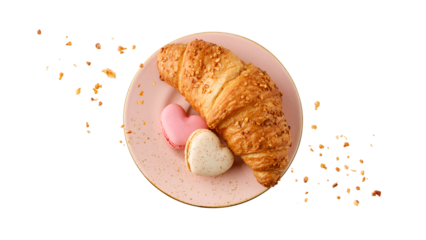 Fresh baked nut croissant and heart shape french cookies macarons macaroons with crumbs on vintage pink plate isolated on white background.