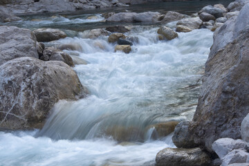 Strong flow of water flowing down from the mountains