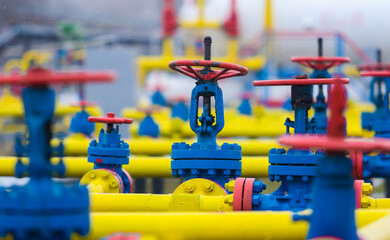 Yellow and blue pipes for pumping gas in winter