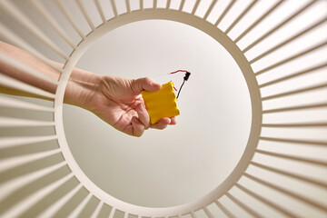 Old batteries are thrown away and recycled in the trash. View from below. The concept of recycling...
