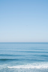 waves in the sea and blue sky