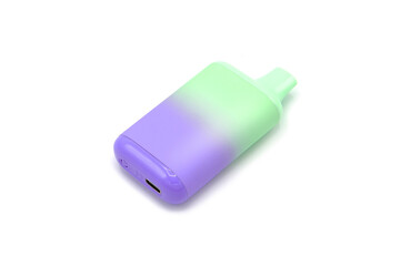 Disposable electronic cigarette with recharging isolated on white background. The concept of modern smoking, vaping and nicotine.