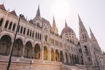 Fototapeta premium Parliament building in Budapest, Hungary, executed in Neo-Gothic, Baroque architecture on a cloudy day