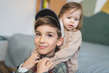 siblings portrait caucasian boy and girl brother and sister at home - Powered by Adobe
