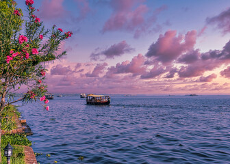 Beautiful landscape with a house boating in marine drive, Kochi, India. Travel and tourism Kerala -...