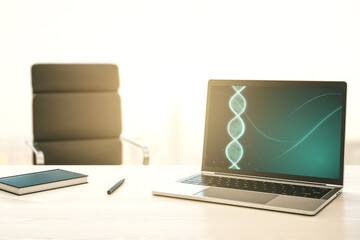 Naklejka premium Modern computer monitor with creative DNA hologram. Bio Engineering and DNA Research concept. 3D Rendering
