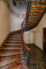 Old vintage spiral staircase at the old mansion © Mulderphoto